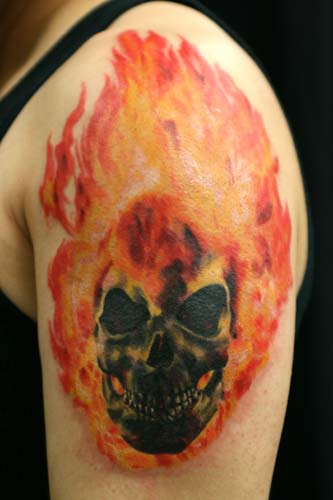 Comments: This ghostrider tattoo was this guys first tattoo.
