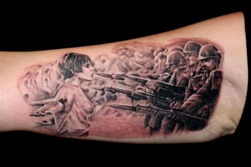 Comments: Very cool tattoo idea. Its a girl standing in front of a row of 