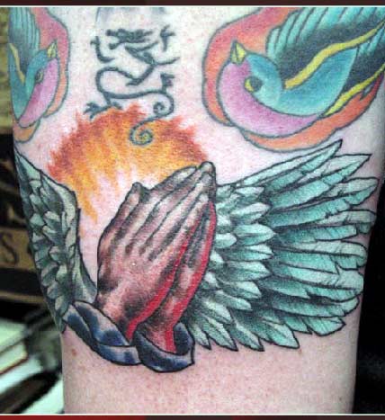 < previous | next > Looking for unique Tattoos? Praying Hands Tattoo